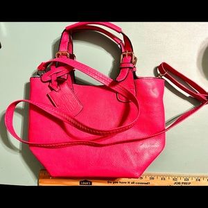 Bright pink faux leather handbag